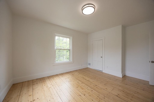 27 Union St Unit 27, Natick, MA 01760 - spare room with light wood-style floors and baseboards