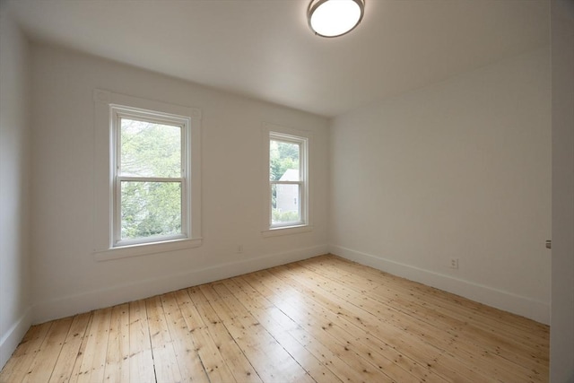 27 Union St Unit 27, Natick, MA 01760 - unfurnished room with hardwood / wood-style flooring and baseboards