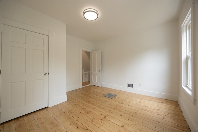 27 Union St Unit 27, Natick, MA 01760 - unfurnished bedroom with light wood finished floors and baseboards