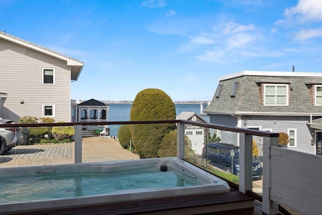 1 W Cliff St, Nahant, MA 01908 - wooden terrace with a water view and a hot tub