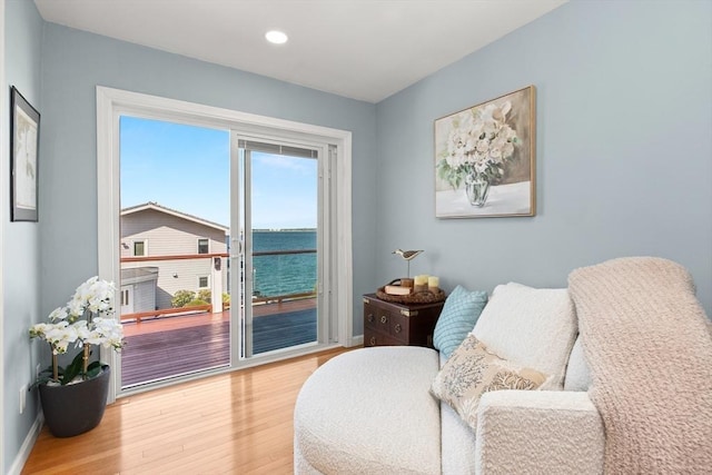 1 W Cliff St, Nahant, MA 01908 - living area with wood finished floors, baseboards, recessed lighting, and a water view