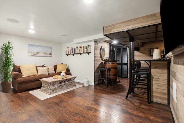 1 W Cliff St, Nahant, MA 01908 - living room featuring wood finished floors, wood walls, recessed lighting, and baseboards