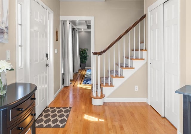 1 W Cliff St, Nahant, MA 01908 - foyer entrance with light wood-type flooring, stairway, and baseboards