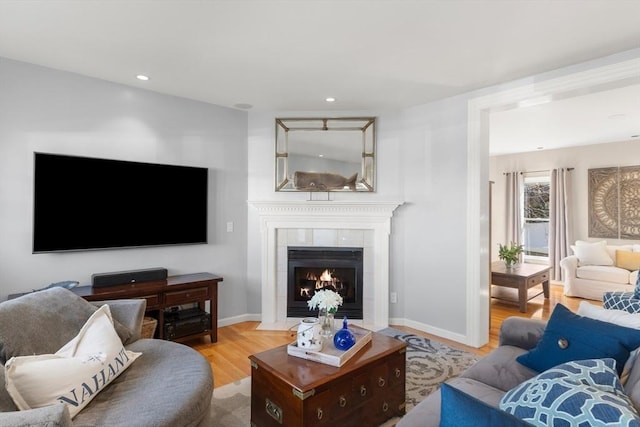 1 W Cliff St, Nahant, MA 01908 - living room with wood finished floors, a tile fireplace, recessed lighting, and baseboards