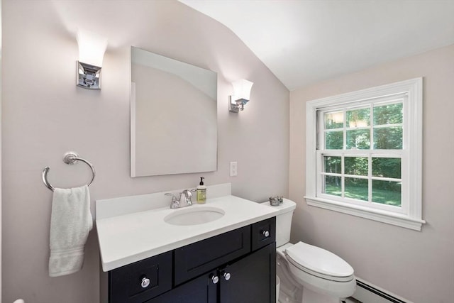 11 Laurel Dr, Scituate, MA 02066 - half bathroom with a baseboard heating unit, vanity, and lofted ceiling
