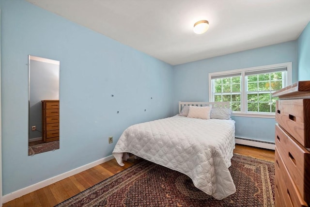 11 Laurel Dr, Scituate, MA 02066 - bedroom featuring baseboard heating and wood finished floors