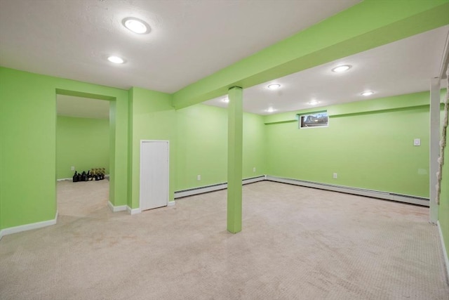 11 Laurel Dr, Scituate, MA 02066 - finished basement with carpet floors, a baseboard radiator, and recessed lighting