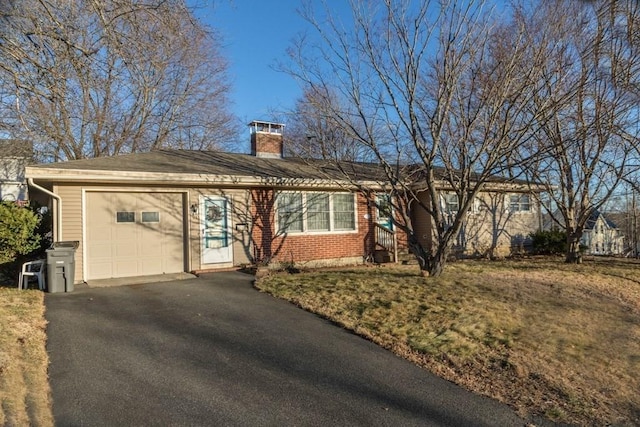 single story home with a garage