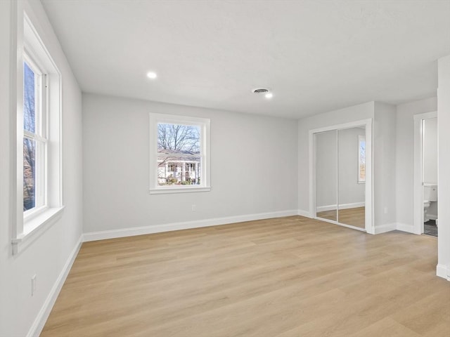 unfurnished bedroom with light hardwood / wood-style floors