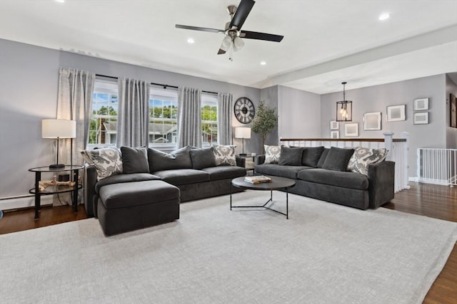 48 W Park Dr, Wakefield, MA 01880 - living area with dark wood-style flooring, recessed lighting, ceiling fan, baseboards, and a baseboard heating unit