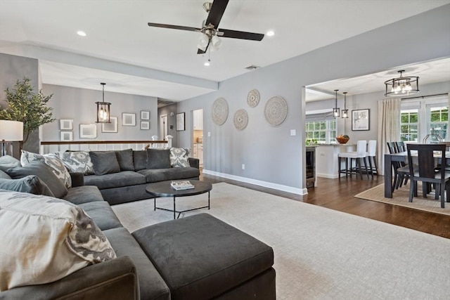 48 W Park Dr, Wakefield, MA 01880 - living room with wood finished floors, a ceiling fan, recessed lighting, beverage cooler, and baseboards