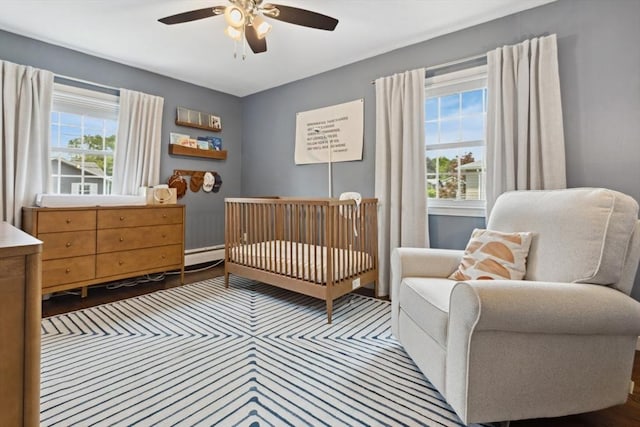 48 W Park Dr, Wakefield, MA 01880 - bedroom featuring a crib and ceiling fan
