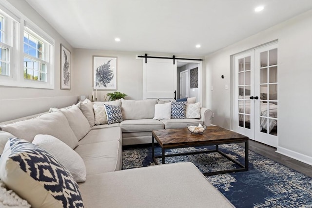 48 W Park Dr, Wakefield, MA 01880 - living area with french doors, a barn door, recessed lighting, dark wood-style flooring, and baseboards