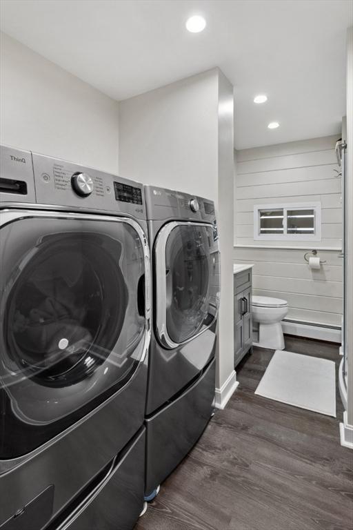 48 W Park Dr, Wakefield, MA 01880 - laundry room featuring baseboard heating, washer and dryer, dark wood finished floors, recessed lighting, and baseboards