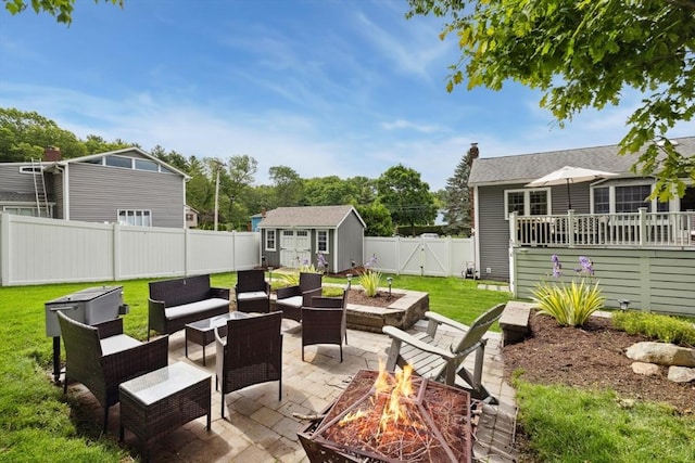 48 W Park Dr, Wakefield, MA 01880 - view of patio with an outdoor living space with a fire pit