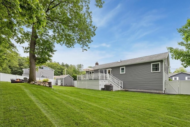 48 W Park Dr, Wakefield, MA 01880 - back of house with a wooden deck, stairway, a gate, and a chimney