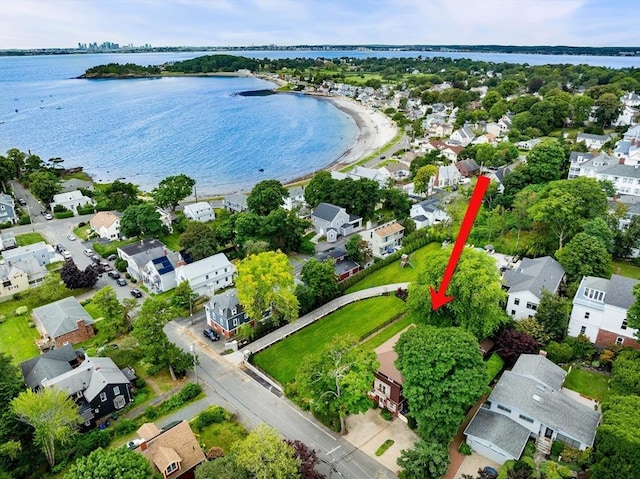 aerial view with a residential view and a water view