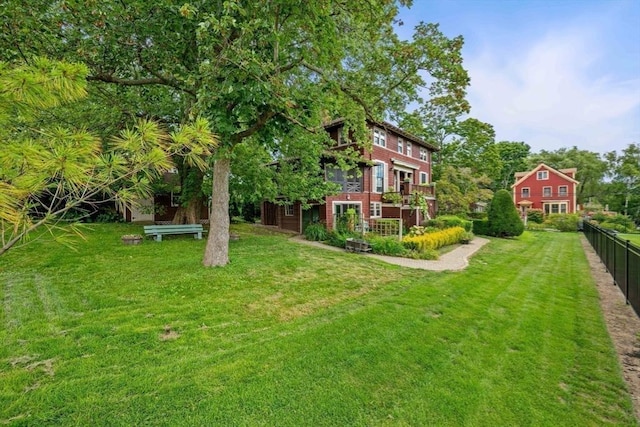 view of yard featuring fence