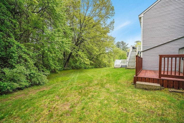 39 Lantern Ln Unit 7, Dracut, MA 01826 - view of grassy yard with a wooden deck