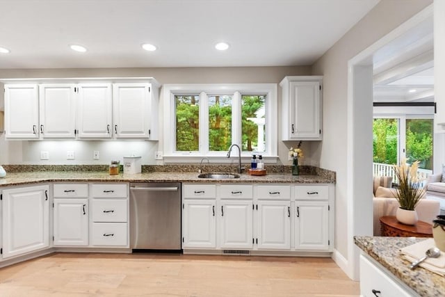 1 Preston Cir, Andover, MA 01810 - kitchen with stainless steel dishwasher, white cabinets, light stone counters, light wood finished floors, and recessed lighting