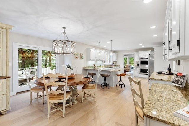 1 Preston Cir, Andover, MA 01810 - dining area featuring light wood-style floors, a chandelier, and recessed lighting