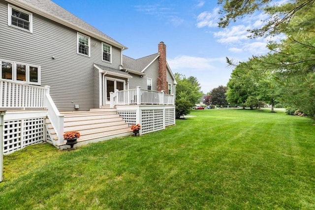 1 Preston Cir, Andover, MA 01810 - rear view of house with a deck, a yard, and a chimney