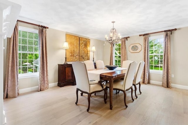1 Preston Cir, Andover, MA 01810 - dining area with light wood-style floors, a chandelier, and ornamental molding