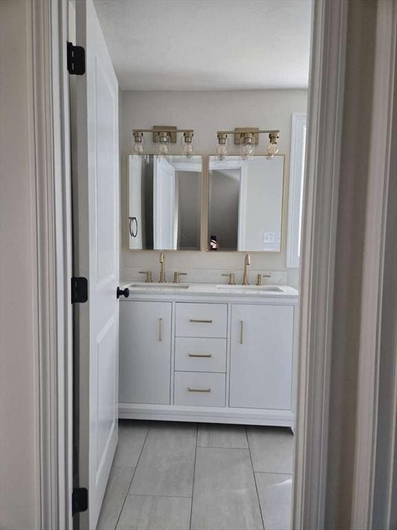 bathroom with vanity and tile patterned floors