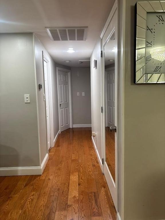 hall featuring light hardwood / wood-style flooring