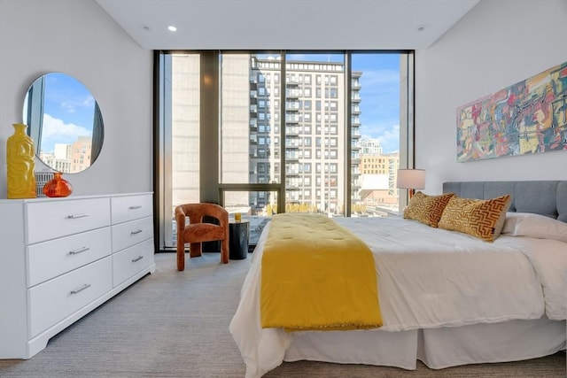 140 Shawmut Ave Unit 5A, Boston, MA 02118 - bedroom featuring a wall of windows, a view of city, and carpet