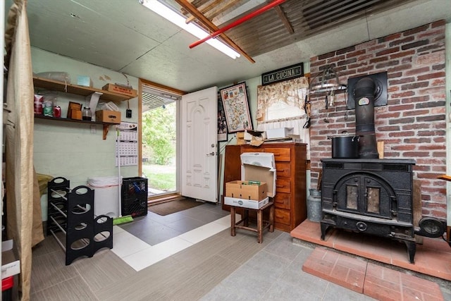 interior space with a wood stove