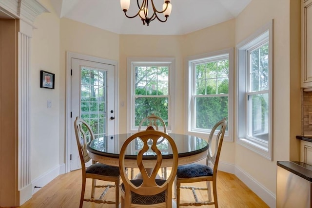 10 Damon Rd, Needham, MA 02494 - dining room with light wood finished floors, baseboards, and a chandelier