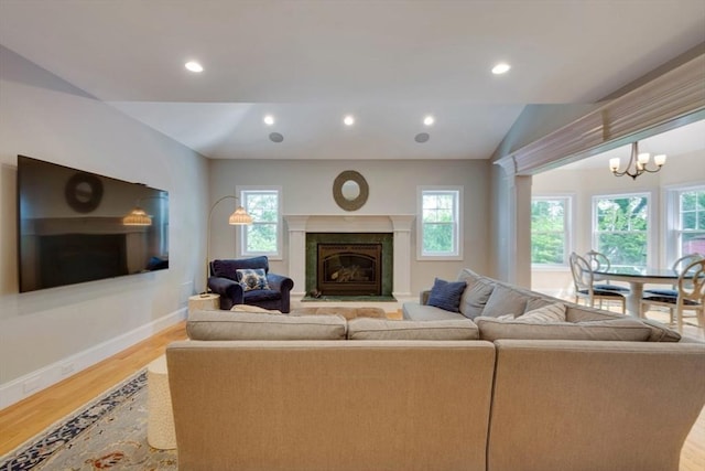 10 Damon Rd, Needham, MA 02494 - living room featuring wood finished floors, a fireplace, healthy amount of natural light, baseboards, and recessed lighting