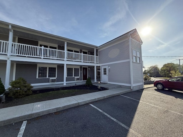 146 Main St Unit 2D, Clinton, MA 01510 - view of building exterior with uncovered parking