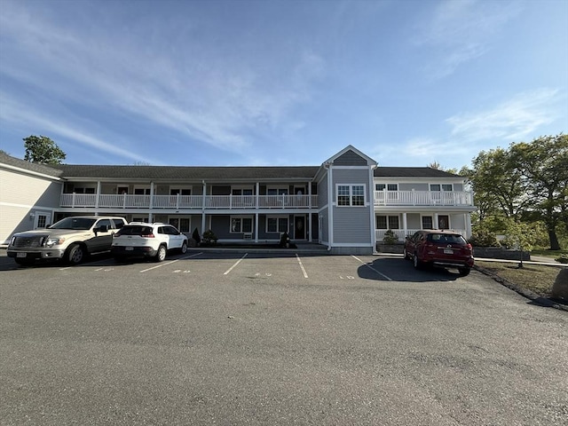 146 Main St Unit 2D, Clinton, MA 01510 - view of building exterior featuring uncovered parking