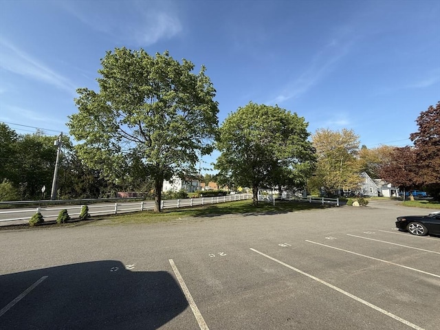 146 Main St Unit 2D, Clinton, MA 01510 - uncovered parking lot with fence