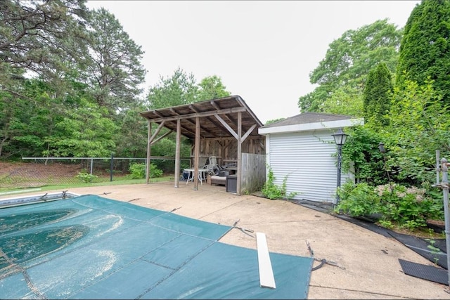 67 Raymond Rd, Plymouth, MA 02360 - view of pool featuring an outbuilding and a patio