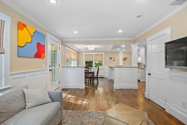 19 Whittier Rd, Wellesley, MA 02481 - living area with crown molding, dark wood finished floors, recessed lighting, a decorative wall, and wainscoting