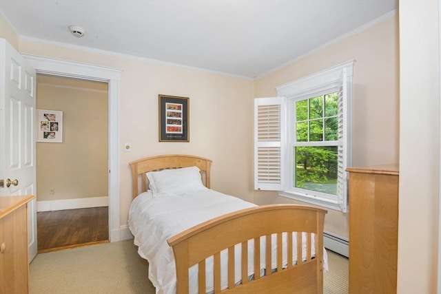 19 Whittier Rd, Wellesley, MA 02481 - bedroom with a baseboard radiator, crown molding, wood finished floors, and baseboards