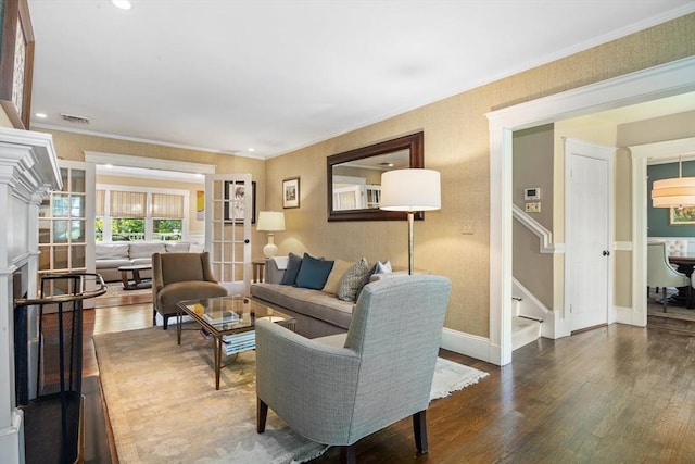 19 Whittier Rd, Wellesley, MA 02481 - living area featuring wood finished floors, stairs, baseboards, crown molding, and recessed lighting