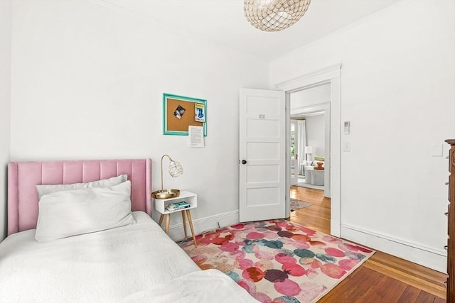 115 Westbourne Ter Unit 1, Brookline, MA 02446 - bedroom featuring wood finished floors and baseboards