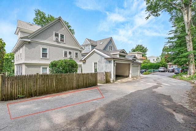 115 Westbourne Ter Unit 1, Brookline, MA 02446 - view of front of home featuring a garage