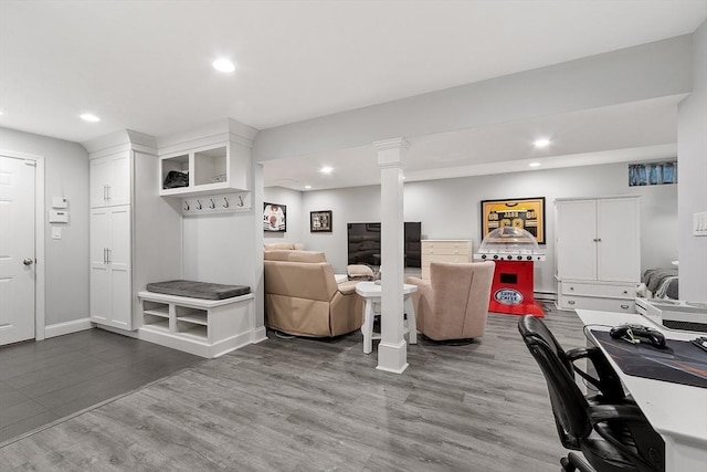 35 Beverly Hill Dr, Shrewsbury, MA 01545 - exercise area with recessed lighting, wood finished floors, baseboards, and a baseboard radiator