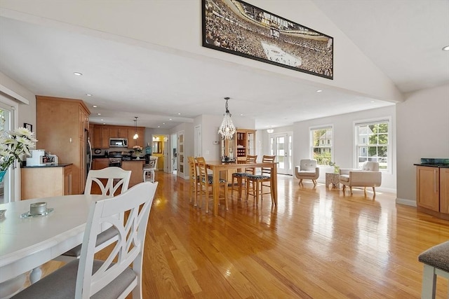 35 Beverly Hill Dr, Shrewsbury, MA 01545 - dining room with light wood finished floors and recessed lighting