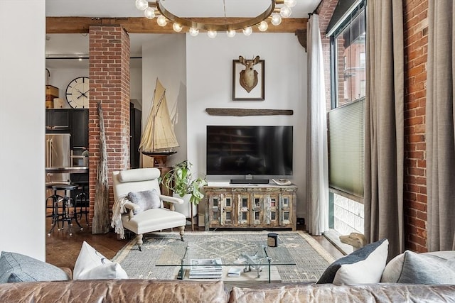 172-178 Green St Unit 1, Boston, MA 02130 - living area with plenty of natural light and brick wall