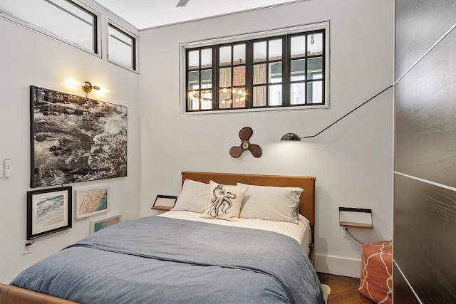 172-178 Green St Unit 1, Boston, MA 02130 - bedroom featuring wood finished floors and baseboards