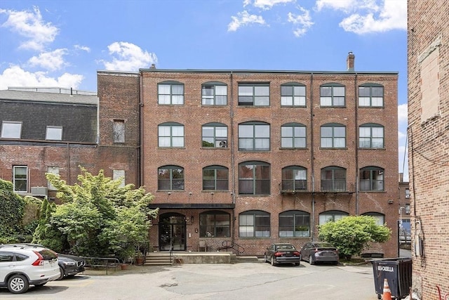 172-178 Green St Unit 1, Boston, MA 02130 - view of building exterior featuring uncovered parking