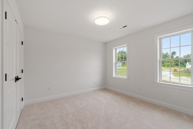 view of carpeted spare room