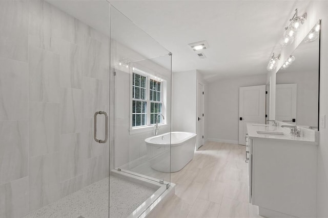 LOT16 Rawson Farm, Mendon, MA 01756 - full bath featuring visible vents, baseboards, vanity, a stall shower, and a freestanding bath