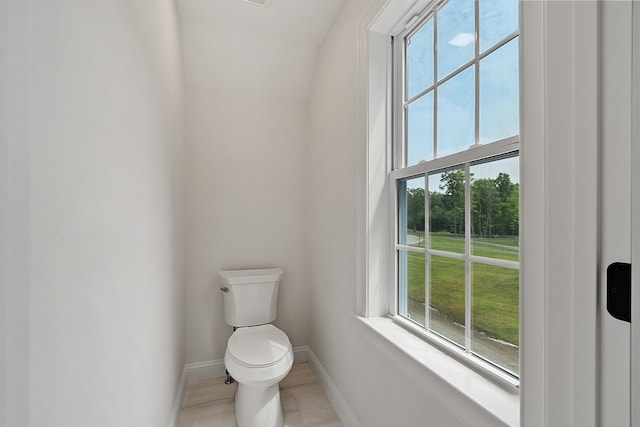 bathroom with tile patterned floors and toilet